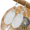 Long ovals of pure white natural sea glass set in our signature Original Wire Bezel© setting.
This sea glass is totally UNALTERED from the way it was found on the beach.
This is the EXACT pair you will receive!