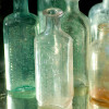 Many old bottles have an aqua hue to them so pinpointing the age is hard.