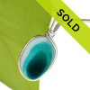 This mixed aqua sea glass pendant in sterling has been sold!
