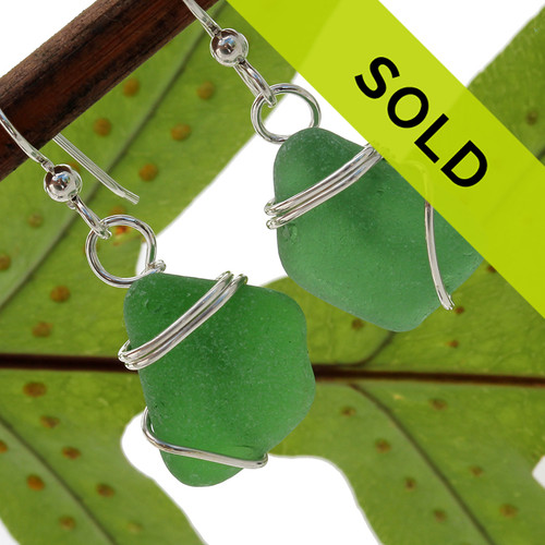 A bit larger, this pair is genuine green sea glass set in simple sterling silver. A nice pair of sea glass earrings.
Sorry this pair has SOLD!