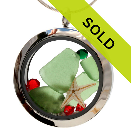 Green sea glass and vivid red and green gemstones make this a great locket necklace for the holidays