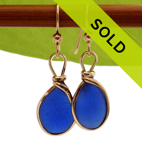 Two perfect cobalt blue sea glass pieces set in our Original Wire Bezel© earring setting in 14K goldfilled earrings