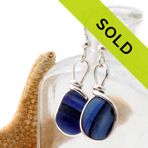 Unusual and hard to match cross sectioned multi End Of Day sea glass from England set in our Original Wire Bezel© sea glass earring setting. This is a VERY HARD sea glass to match and is a once in a lifetime pair!
Sorry this one of a kind pair of sea glass earrings has been sold!