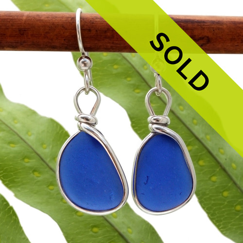 Perfect shaped cobalt blue sea glass pieces set in our Original Wire Bezel© setting. This pair comes on quality sterling silver lever back ear wires.