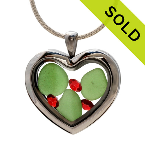 Green sea glass and vivid bright red and intense green gemstones make this a great heart locket necklace for the holidays,
Sorry this Sea Glass Jewelry selection has been SOLD!