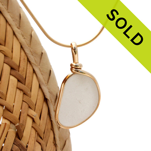 SOLD - Sorry this Sea Glass Pendant is NO LONGER AVAILABLE!
A neat shaped piece of pure white sea glass in our Original Wire Bezel© necklace pendant in 14K Goldfilled setting.