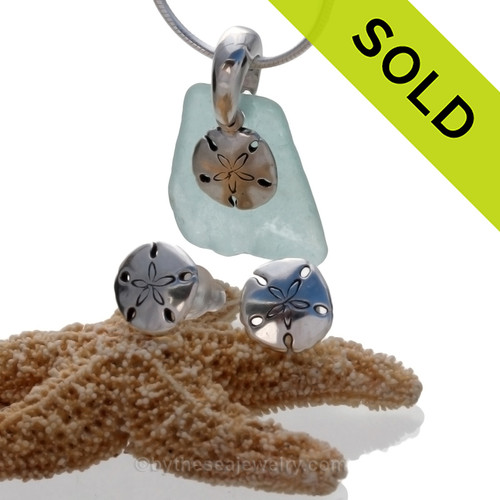 Aqua blue sea glass is combined with a solid sterling bail and sandollar sterling charms in this lovely sea glass set. Post earrings with comfort clutches finish the set.
Sorry this sea glass jewelry selection has been sold!