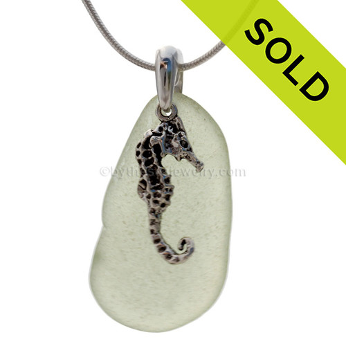 Beach found seafoam green sea glass is combined with a solid sterling large seahorse charm and presented on an 18 Inch solid sterling snake chain.
Sorry this piece of sea glass jewelry has been sold!
