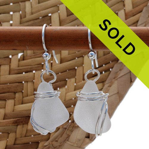 Perfect natural triangles of pure white sea glass set in a solid sterling silver setting.
Sorry these sea glass earrings have been sold!