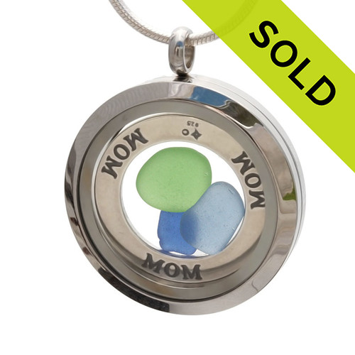 A  piece of genuine sea glass in blue, green and periwinkle and a solid sterling MOM disk that also reads WOW upside down.
SOLD - Sorry This Sea Glass Jewerly Selection Is NO LONGER AVAILABLE!