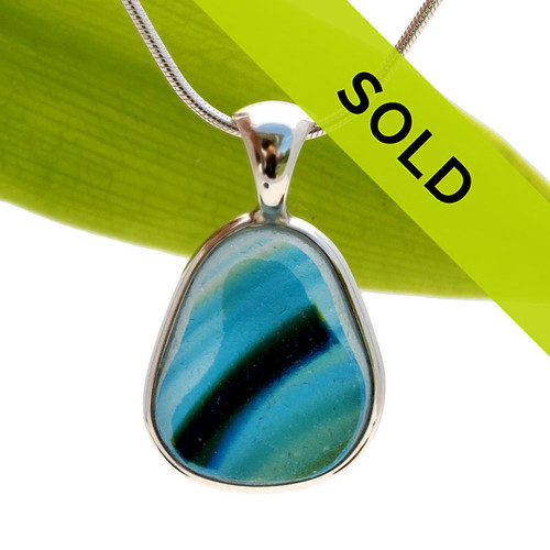 This ultra ULTRA RARE 4+ Color Multi Seaham sea glass pendant is set in our Deluxe Wire Bezel© pendant setting.
Sorry this one of a kind piece is no longer available!