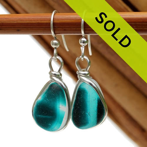 A great match in my English Multi Sea Glass Earrings in a vivid mixed Deep Aqua or Teal set in our Original Wire Bezel© setting in silver.

Sorry these sea glass earrings have already been sold!