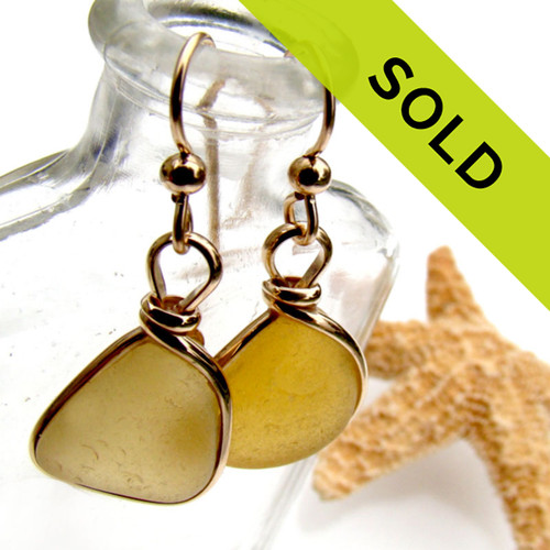 This lovely pair of golden sea glass earrings has been sold.
