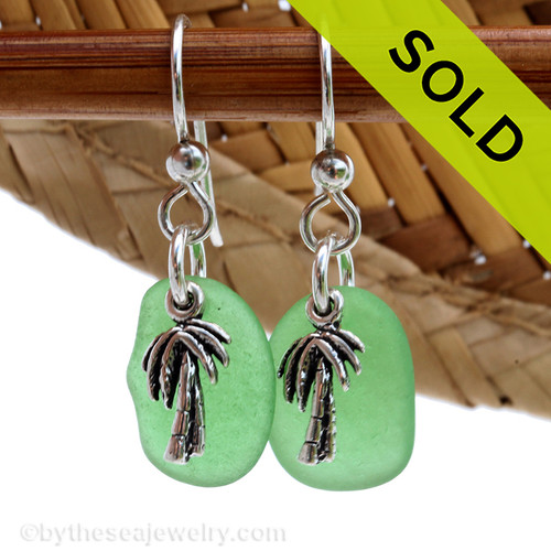 A simple pair of genuine green sea glass earrings with sterling silver pal tree charms in a lightweight simple setting.
SOLD - Sorry these Sea Glass Earrings are NO LONGER AVAILABLE!