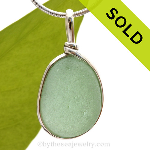 A beautiful PERFECT piece of seafoam green sea glass set in our Original Wire Bezel pendant setting. 
Sorry this Sea Glass Necklace Pendant has been SOLD!