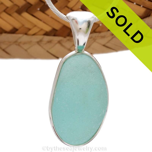 This is a beautiful LARGE Seaham Bright Aqua Sea Glass set in our Deluxe Wire Bezel© pendant setting. 
Sold - sorry this Sea Glass Jewelry selection is no longer available.