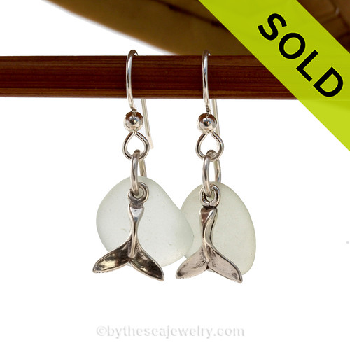 A perfect matched pair of beautiful very pale green sea glass earrings combined with solid sterling Whale Tail charms.
SOLD - Sorry these Sea Glass Earrings are NO LONGER AVAILABLE!