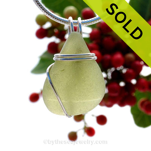 This natural perfect sea glass piece is Light Olive Green Genuine Sea Glass In Sterling Sea Swirl Setting Pendant for Necklace .
Sorry this Sea Glass Pendant has been SOLD!