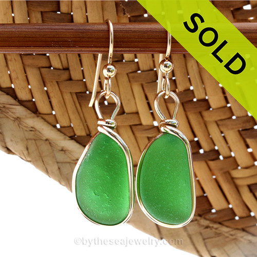 SOLD - These Sea Glass Earrings are NO LONGER AVAILABLE!
Perfect natural long thick sea glass pieces set in our in 14K G/F Original Wire Bezel© sea glass earring setting.
All of our sea glass jewelry is individually photographed. This is the EXACT pair of sea glass earrings you will receive!