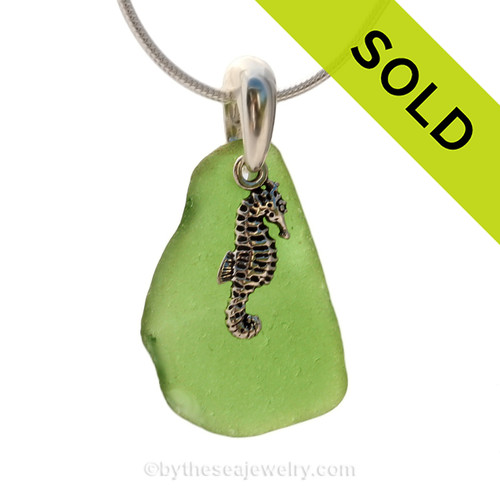 Bright Green sea glass set on a solid sterling cast bail with a sterling silver Sea Horse charm.
The sea glass necklace comes on our 18" solid sterling smooth snake chain (SHOWN and included)
SOLD - Sorry This Sea Glass Necklace Is NO LONGER AVAILABLE!