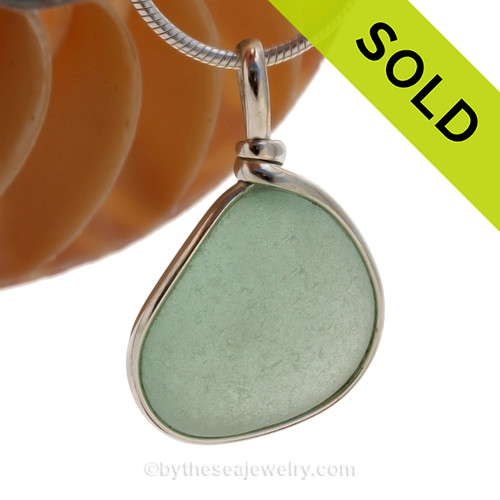 A perfect piece of beach found glass set in our Original Wire Bezel© pendant setting.
SOLD - Sorry this Sea Glass Pendant is NO LONGER AVAILABLE!