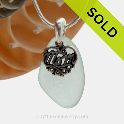 A beautiful and PERFECT beach found aqua sea glass necklace set on a solid sterling cast bail with a sterling silver mom charm