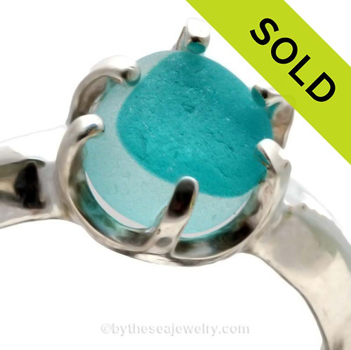 A spectacular piece of Vivid Aqua Mixed English Sea Glass set in a sturdy 6 prong Solid Sterling ring setting.
SOLD - Sorry this Ultra Rare Sea Glass Ring is NO LONGER AVAILABLE!