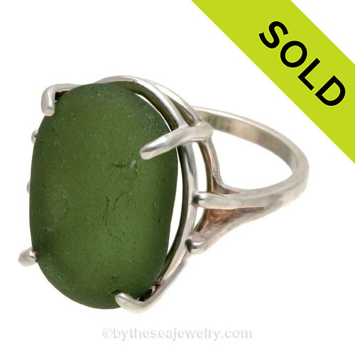 An UNALTERED piece of perfect seaweed green white sea glass set in a solid sterling silver basket ring.
SOLD - Sorry this Sea Glass Ring is NO LONGER AVAILABLE!