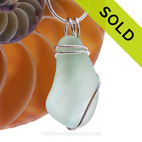 Vivid bright Seafoam well aged Genuine Sea Glass Pendant in a Solid Sterling Silver Basic Wirewrap.
