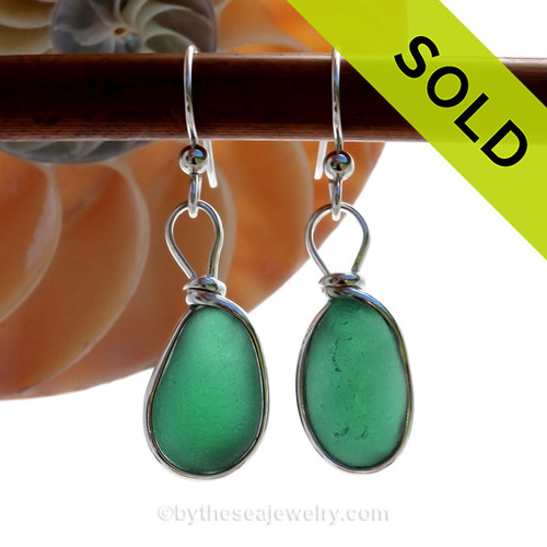  Vivid Green Glowing Sea Glass Earrings set in our Original Wire Bezel Setting lets all the beauty of these beauties shine! 
This setting does not alter the sea glass from the way it was found on the beach.