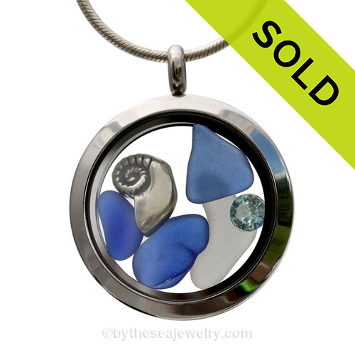 December Tides - Genuine Sea Glass, Sterling Nautilus Shell with Crystal Gems in a Stainless Steel Locket
