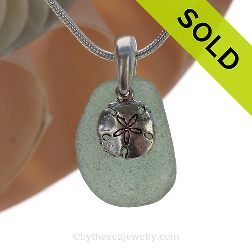 Smaller Teal Green Sea Glass With Sterling Silver Sandollar Charm - 18" STERLING CHAIN INCLUDED.
SOLD - Sorry this Sea Glass Necklace is NO LONGER AVAILABLE!