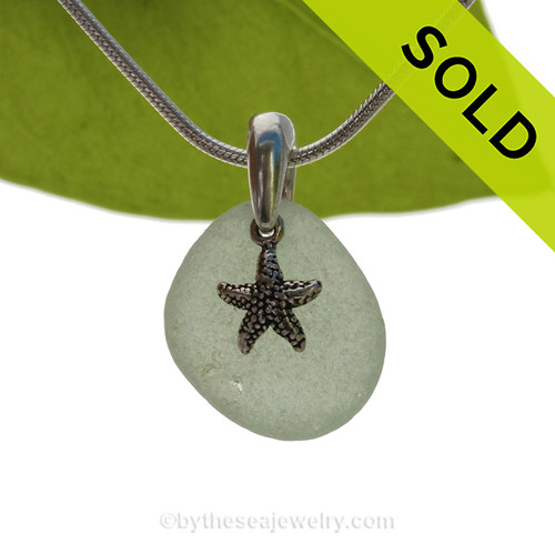 Seafoam Green Sea Glass Necklace With Sterling Silver Sandollar Starfish Charm.
SOLD - Sorry this Sea Glass Necklace is NO LONGER AVAILABLE!
