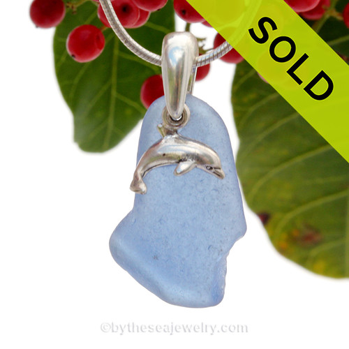 Not perfect but rare Carolina Blue beach found Sea Glass Necklace set on a Solid Sterling cast bail with a sterling silver Dolphin Charm.
SOLD - Sorry this Sea Glass Necklace is NO LONGER AVAILABLE!