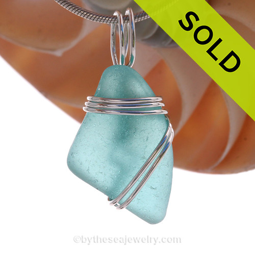 A stunning PERFECT Genuine Electric Aqua Sea Glass Pendant set in our secure Triple Wire  setting in Sterling Silver.