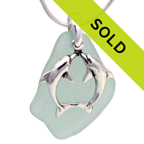 Sorry this seafoam green sea glass necklace with dolphins has been sold!