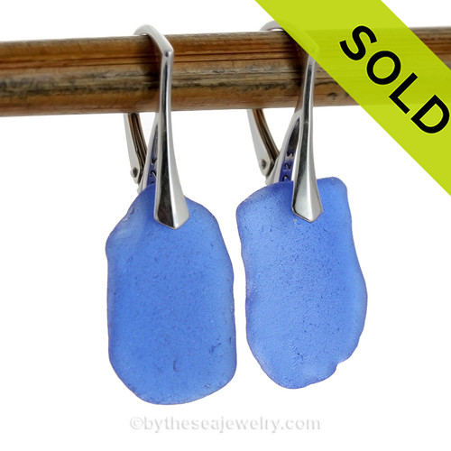 Large Yet Lightweight Lovely Simply Sea Glass Cobalt Blue  Beach Found Sea Glass Earrings on Sterling Leverback Earrings.

Blue sea glass becomes increasing as each wave passes. Shaped only by tide and time and UNALTERED from the way it was found on the beach (other than the hole).