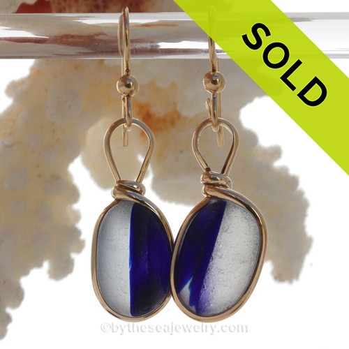 Cross Sectioned Pure White and Dark Blue Sea Glass Earrings set in our Original Wire Bezel© setting In 14K Goldfilled.