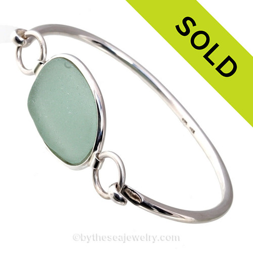 Genuine Oval Seafoam Green Sea Glass Bangle Bracelet set in our Premium Deluxe Wire Bezel© sterling silver setting.