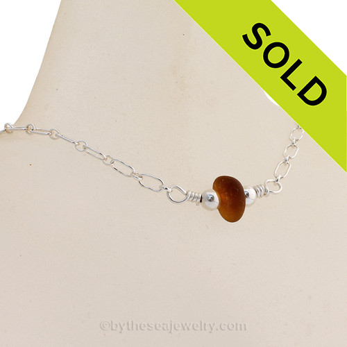 A perfect piece of Glowing Caramel Brown Natural Genuine Sea Glass on a Sterling Long and Short Link Chain.
Beautiful well aged natural sea glass shaped only by tide and time!
All Solid Sterling Elements
Top Quality Small Solid Sterling Lobster Claw Clasp.