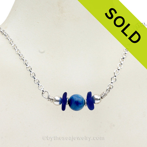 Simply Sea Glass Necklace with Cobalt Blue Sea Glass and a focal bead of Genuine Lapis all on Solid Sterling Silver.
SOLD - Sorry This Sea Glass Jewelry Item is NO LONGER AVAILABLE!