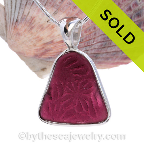 This Huge and Thin Embossed Plum Genuine Sea Glass set in Solid Sterling Silver Deluxe Wire Bezel setting. This setting leaves this amazing natural sea glass piece just the way it was found on  the beach!
 This setting leaves this amazing natural sea glass piece just the way it was found on  the beach! 