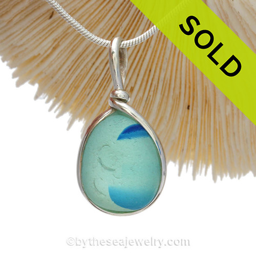 Small but mightly this mixed aqua and blue Multi Sea Glass Pendant In Original Wire Bezel Setting© is bound to get noticed!