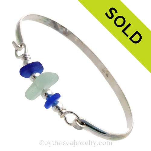 Lucky Cobalt and Soft Summery Sea Green Sea Glass combined Solid Sterling Beads on this Solid Sterling Silver Premium Sea Glass Bangle Bracelet.