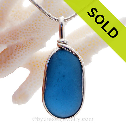 A stunning piece of Robins Egg Blue English Sea Glass set in our Original Deluxe Wire Bezel© necklace pendant.