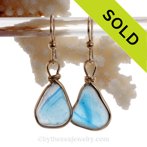 Vivid and RARE Mixed Electric Aqua Genuine Sea Glass pieces set in our Original Wire Bezel setting in 14K Rolled Gold.