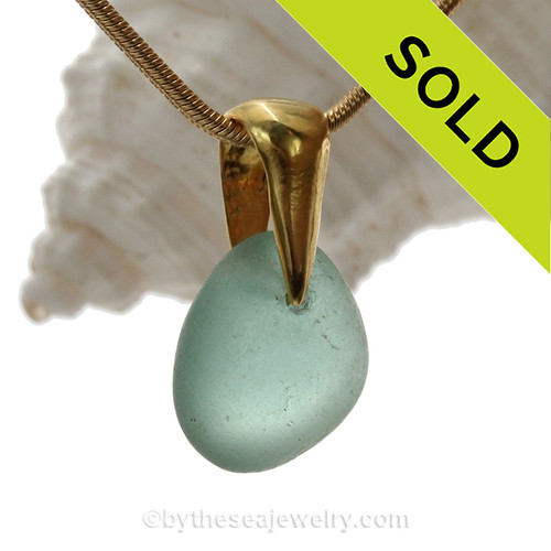 A lovely piece glowing Petite aqua blue sea glass on a nautical 24K gold Vermeil (gold on silver) necklace. 