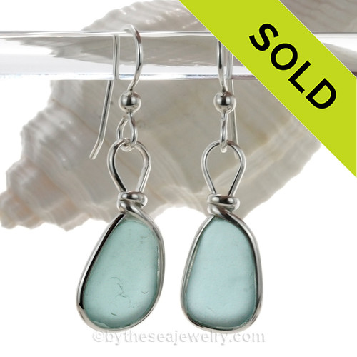 Genuine naturally collected Aqua Blue sea glass from Hawaii in our ORIGINAL Wire Bezel© setting in Silver.