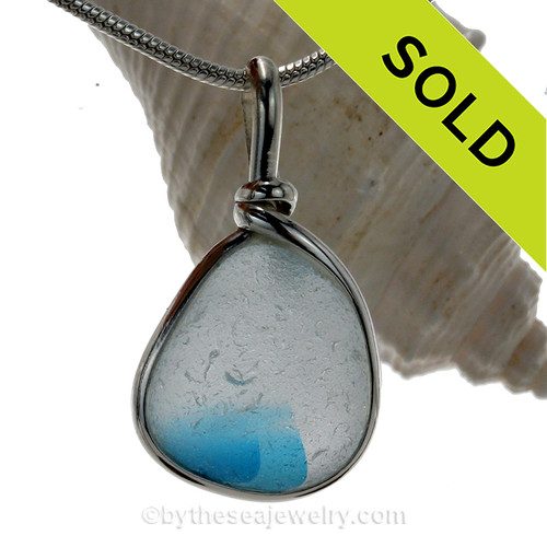 A Lovely Petite Mixed Electric Aqua Blue multi sea glass set in Sold Sterling Silver Deluxe Wire Bezel© pendant setting.