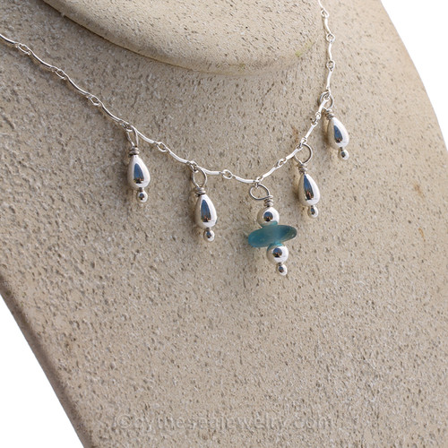 Stunning Mixed Ocean Color Seaham Sea Glass Necklace on All Solid Sterling Silver curved Bar Necklace. Finished with sterling teardrop beads.